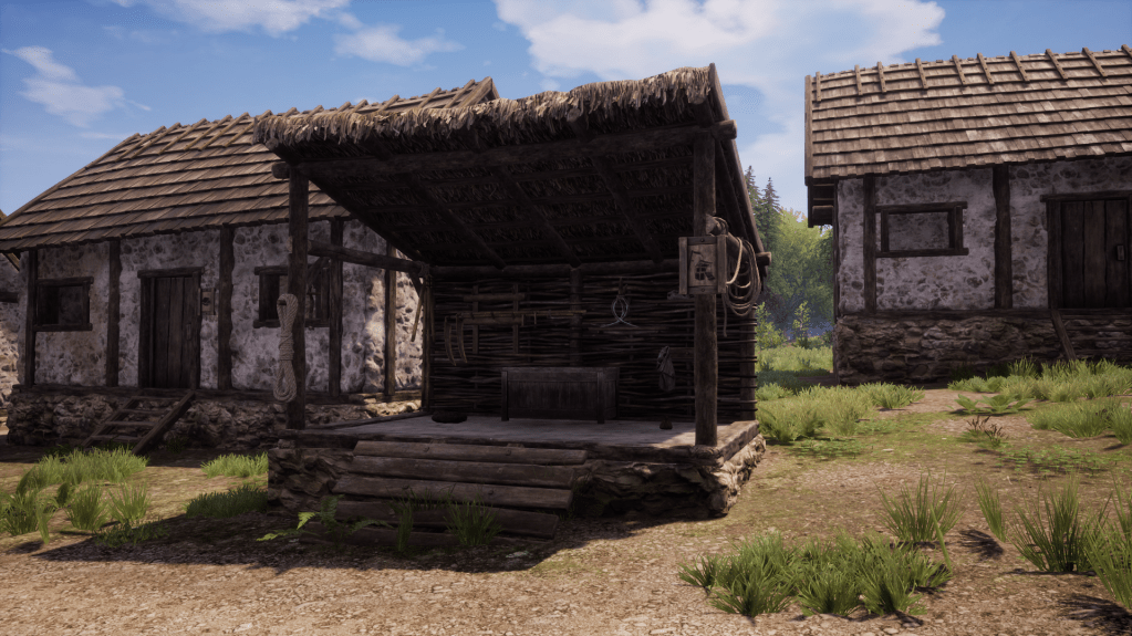 Farm shed close to some houses.