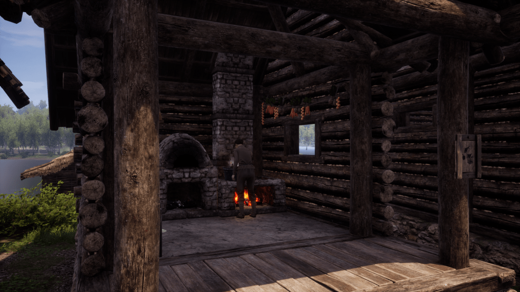 Worker being busy in the kitchen.