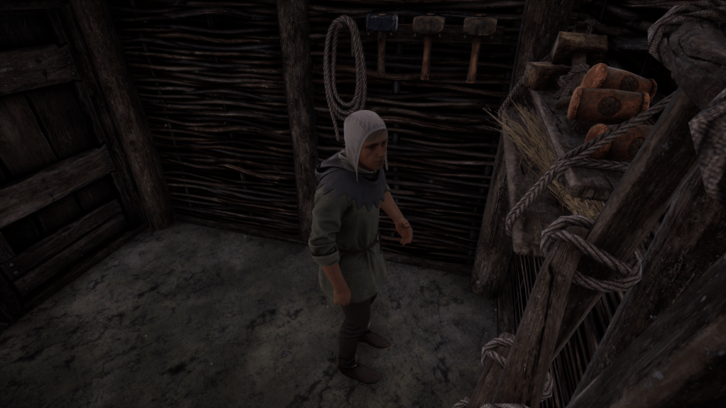 Wielemir standing in a storage building.