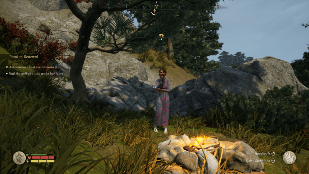 Onibaba dancing next to a campfire.