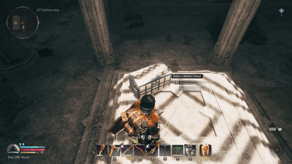 A chest sitting under a sunbeam in return to moria